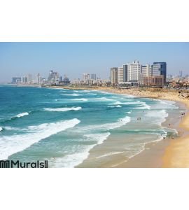 Sea coast and the view of Tel Aviv at the evening Wall Mural