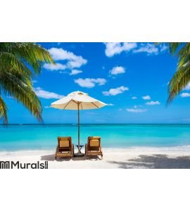 Two deckchairs on the idyllic white beach Wall Mural