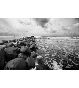 Flying clouds above seashore Wall Mural